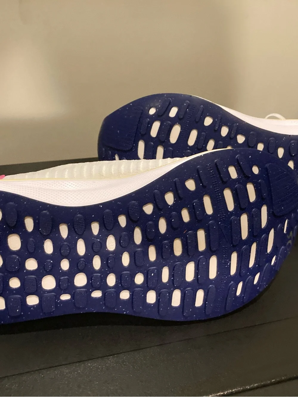 Nike White Athletic Shoes with Blue Swoosh and Yellow Midsole